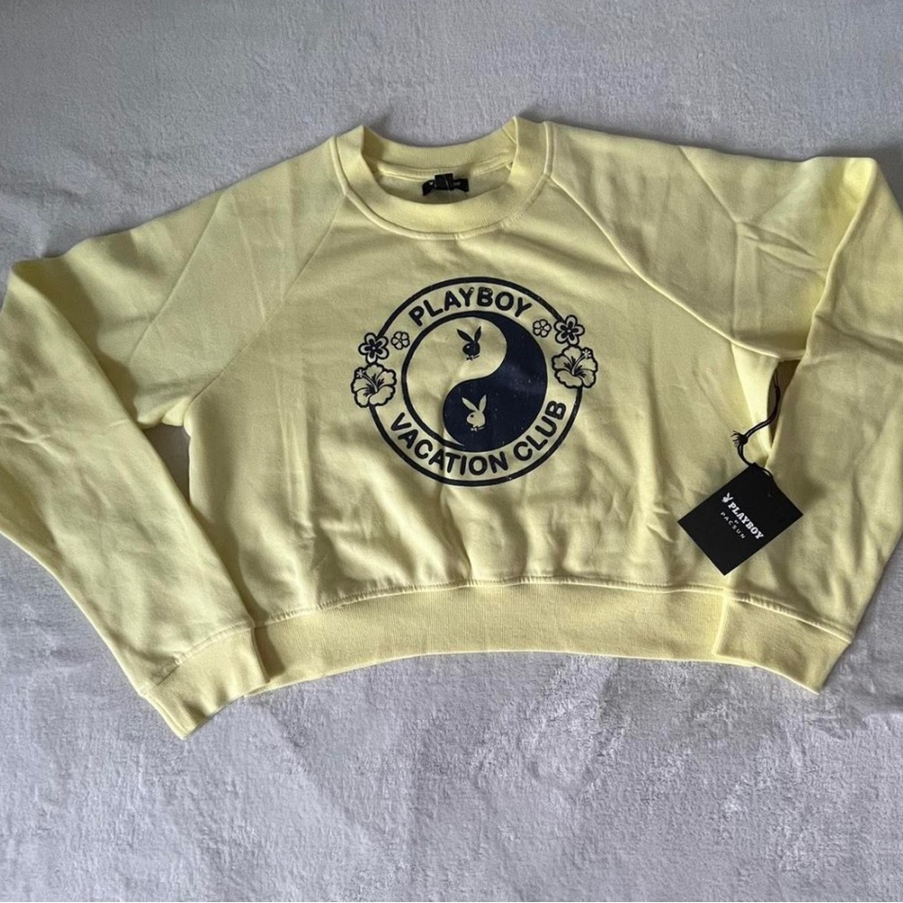 pastel subtle yellow long sleeve sweatshirt.